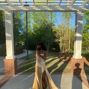 Beautiful gold dress with a nice slit on the left side